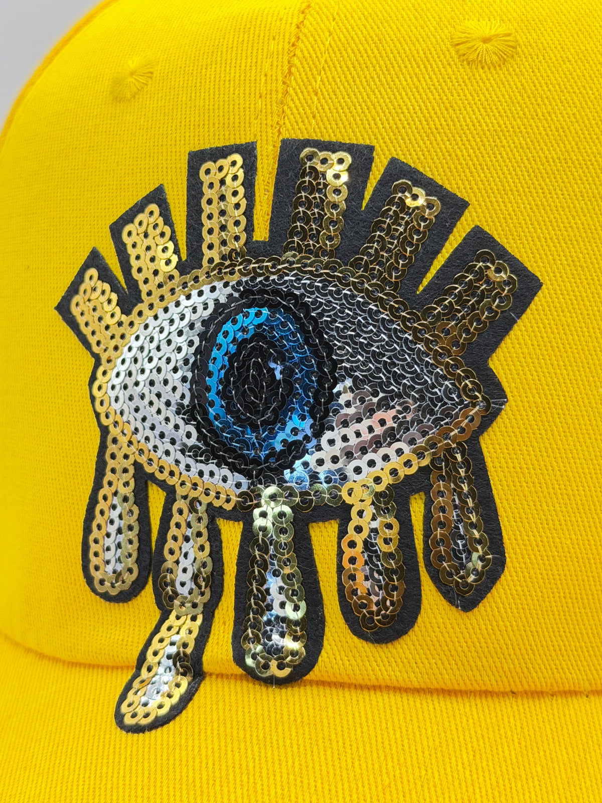 Golden Embroidered Sequin Melting Eye Cap